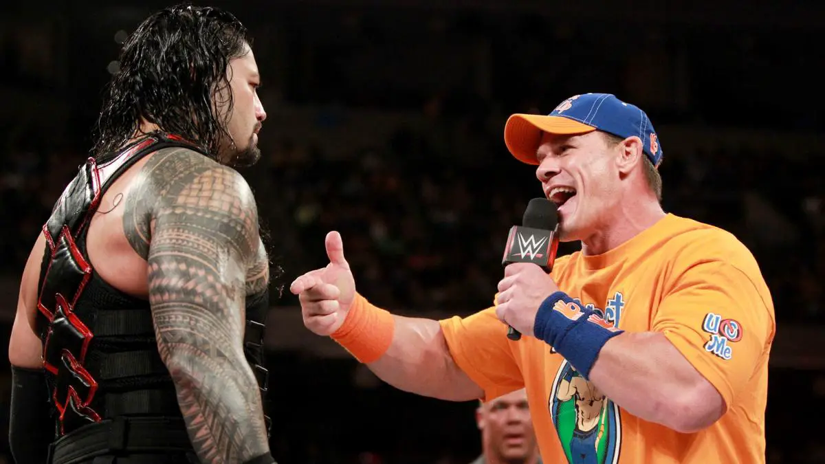 John Cena and Roman Reigns throw down in heated contract signing on Raw