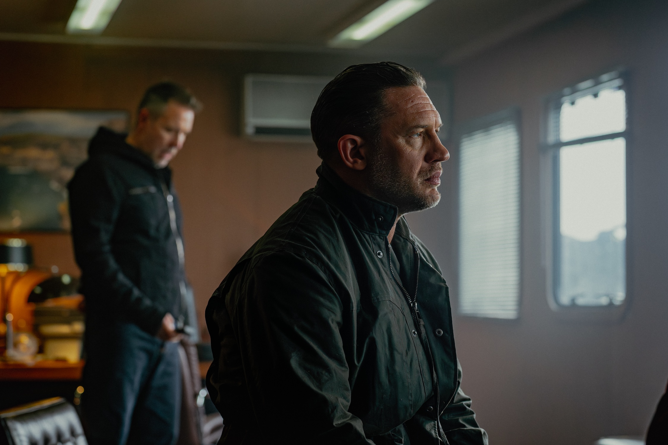L-R Paddy Considine as Kevin Harrigan and Tom Hardy as Harry Da Souza in MOBLAND, episode 3, season 1,