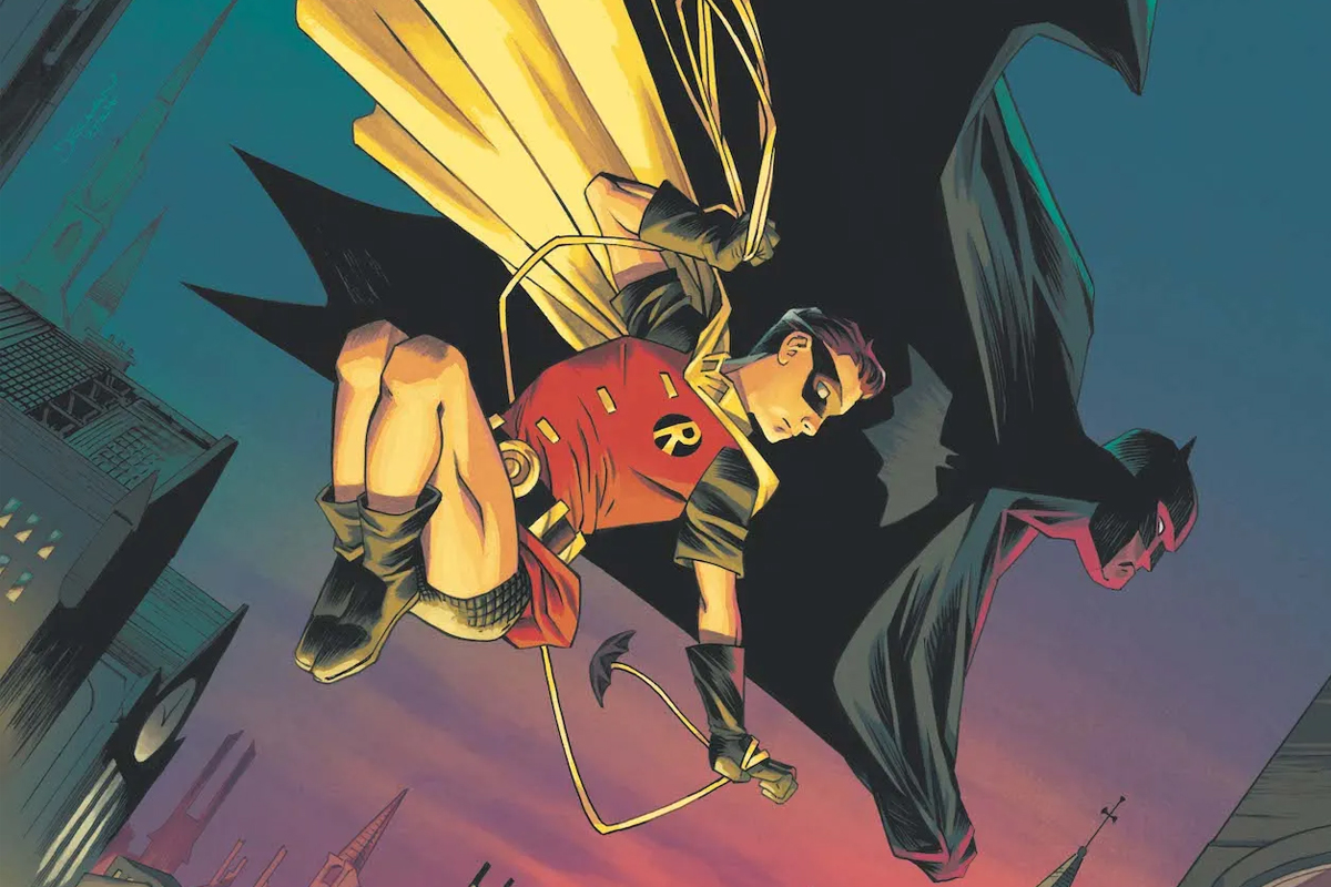 Batman and Dick Grayson as Robin leap to the street below