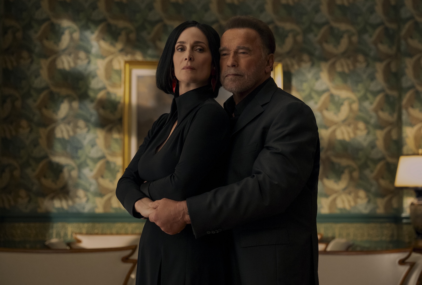 (L to R) Carrie-Anne Moss as Greta Nelso, Arnold Schwarzenegger as Luke Brunner in episode 202 of Fubar tv picks